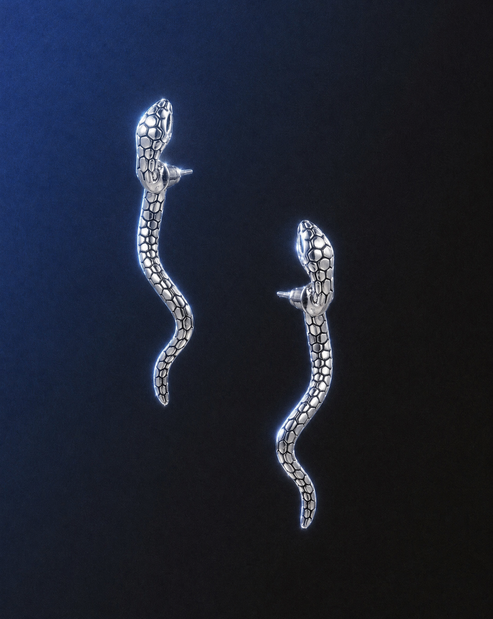 Serpent Spell Earrings in white gold-plated brass from Love Your Beauty