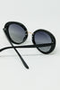 Minimal oval sunglasses with gold detail