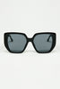 Black Pin-Up Style Sunglasses With Geometric Design and Cat Eyes